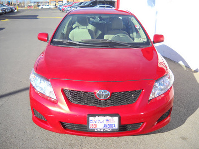toyota corolla 2009 red sedan gasoline 4 cylinders front wheel drive automatic 79925