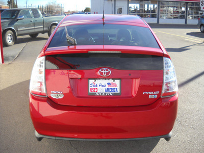 toyota prius 2009 red hatchback hybrid 4 cylinders front wheel drive automatic 79925