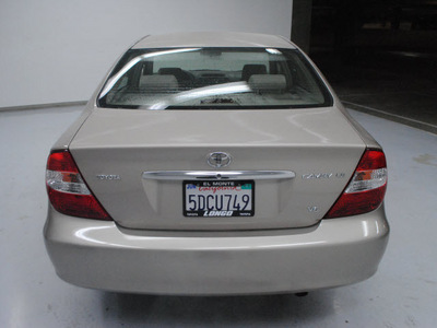 toyota camry 2003 tan sedan le v6 gasoline 6 cylinders front wheel drive automatic 91731