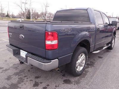 ford f 150 2006 blue xlt gasoline 8 cylinders 4 wheel drive automatic 14224
