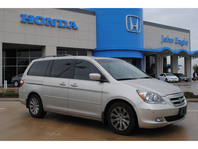 honda odyssey 2006 silver van touring gasoline 6 cylinders front wheel drive automatic with overdrive 77065