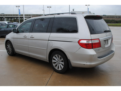 honda odyssey 2006 silver van touring gasoline 6 cylinders front wheel drive automatic with overdrive 77065