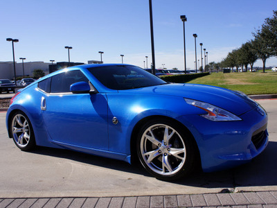 nissan 370z 2010 blue coupe gasoline 6 cylinders rear wheel drive 6 speed manual 76018