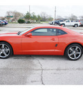 chevrolet camaro 2012 orange coupe gasoline 6 cylinders rear wheel drive 6 spd auto onstar,1 yr safe and snd 77090