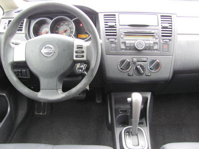 nissan versa 2008 silver hatchback sl gasoline 4 cylinders front wheel drive automatic 33884