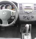 nissan versa 2008 silver hatchback sl gasoline 4 cylinders front wheel drive automatic 33884