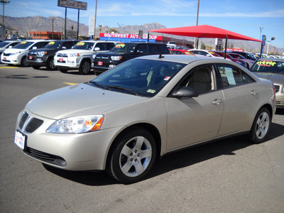 pontiac g6 2009 gold sedan gasoline 4 cylinders front wheel drive automatic 79925