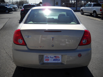 pontiac g6 2009 gold sedan gasoline 4 cylinders front wheel drive automatic 79925