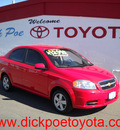 chevrolet aveo 2010 red sedan gasoline 4 cylinders front wheel drive automatic 79925