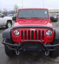 jeep wrangler 2010 red suv unlmted rubicon gasoline 6 cylinders 4 wheel drive 6 speed manual 60443