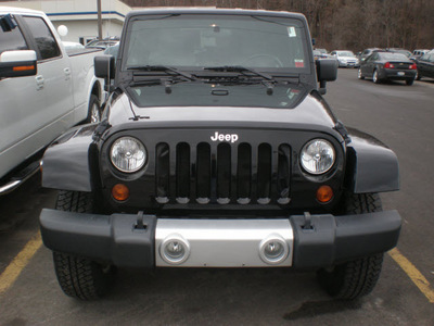 jeep wrangler 2009 black suv sahara gasoline 6 cylinders 4 wheel drive 6 speed manual 13502