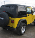 jeep wrangler 2002 yellow suv sport gasoline 6 cylinders 4 wheel drive automatic 62863