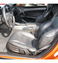 chevrolet corvette 2007 orange coupe gasoline 8 cylinders rear wheel drive automatic 77090