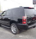 gmc yukon 2012 black suv denali flex fuel 8 cylinders all whee drive automatic with overdrive 28557