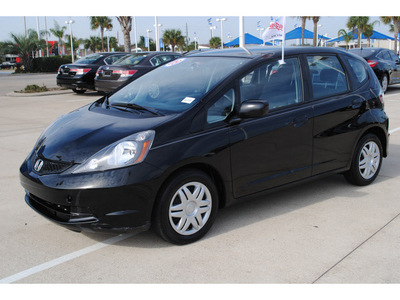 honda fit 2009 black hatchback gasoline 4 cylinders front wheel drive automatic 77065