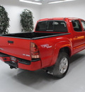 toyota tacoma 2006 red v6 gasoline 6 cylinders 4 wheel drive 6 speed manual 91731