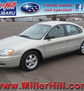 ford taurus 2004 gold sedan se gasoline 6 cylinders front wheel drive automatic with overdrive 55811