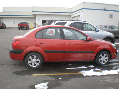 kia rio 2007 red sedan gasoline 4 cylinders front wheel drive automatic with overdrive 13502