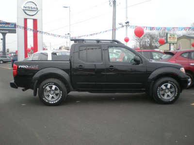 nissan frontier 2011 black gasoline 6 cylinders 4 wheel drive automatic with overdrive 13502