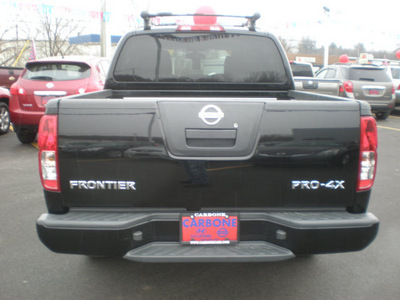 nissan frontier 2011 black gasoline 6 cylinders 4 wheel drive automatic with overdrive 13502