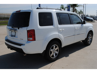 honda pilot 2010 white suv touring w navi w dvd gasoline 6 cylinders front wheel drive automatic with overdrive 77065