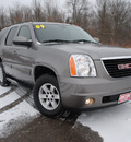 gmc yukon 2009 dk  gray suv slt flex fuel 8 cylinders 4 wheel drive automatic 44024