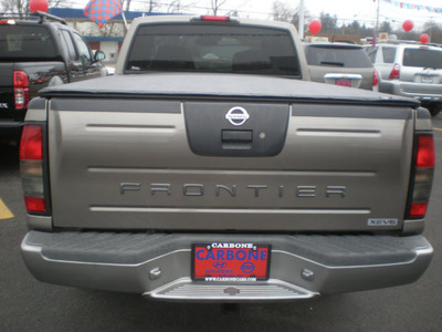 nissan frontier 2004 gray gasoline 6 cylinders 4 wheel drive 5 speed manual 13502