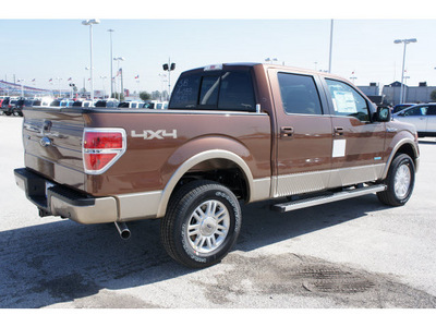 ford f 150 2012 brown lariat gasoline 6 cylinders 4 wheel drive automatic 77388