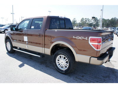 ford f 150 2012 brown lariat gasoline 6 cylinders 4 wheel drive automatic 77388