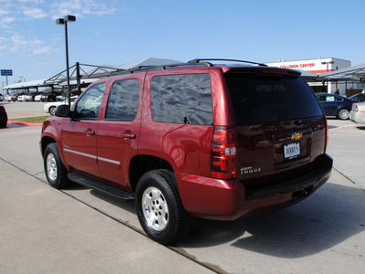 chevrolet tahoe 2011 red suv lt flex fuel 8 cylinders 4 wheel drive automatic 76087