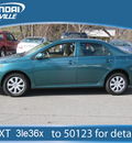 toyota corolla 2010 dk  green sedan le gasoline 4 cylinders front wheel drive automatic 28805