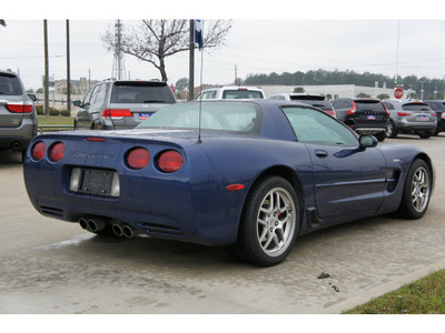 chevrolet corvette 2004 blue coupe z06 gasoline 8 cylinders rear wheel drive standard 77090