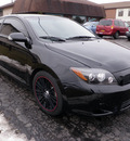 scion tc 2009 black coupe trd release series gasoline 4 cylinders front wheel drive 5 speed manual 14224