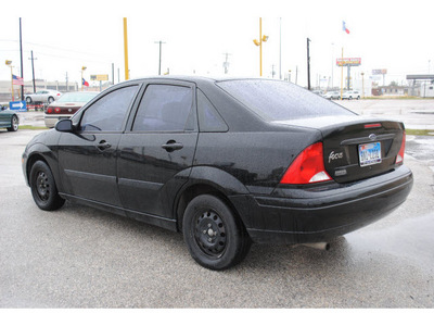 ford focus 2001 black sedan lx gasoline 4 cylinders front wheel drive automatic with overdrive 77037