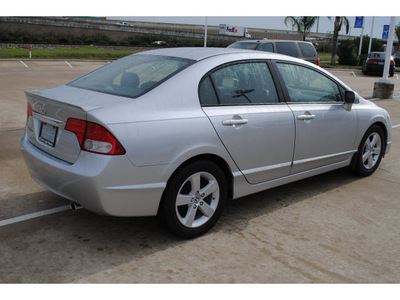 honda civic 2010 silver sedan lx s gasoline 4 cylinders front wheel drive 5 speed manual 77065