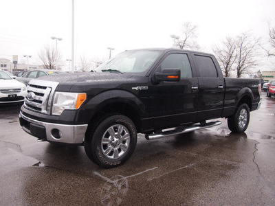 ford f 150 2009 black xlt gasoline 8 cylinders 4 wheel drive automatic with overdrive 46168