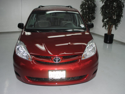 toyota sienna 2007 red van le 7 passenger gasoline 6 cylinders front wheel drive automatic 91731