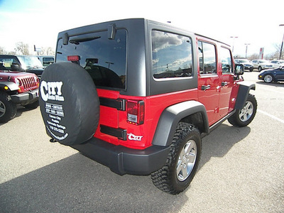 jeep wrangler 2012 red suv unlimited rubic gasoline 6 cylinders 4 wheel drive automatic 81212