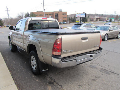 toyota tacoma 2006 tan gasoline 6 cylinders 4 wheel drive automatic 13502