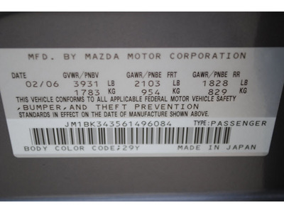 mazda mazda3 2006 gray hatchback gasoline 4 cylinders front wheel drive 5 speed manual 77065