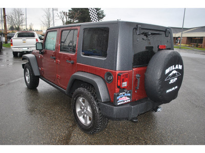 jeep wrangler unlimited 2010 dark red suv rubicon gasoline 6 cylinders 4 wheel drive 6 speed manual 98371