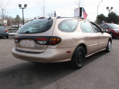 mercury sable 1997 tan wagon gs gasoline 6 cylinders front wheel drive automatic 80229