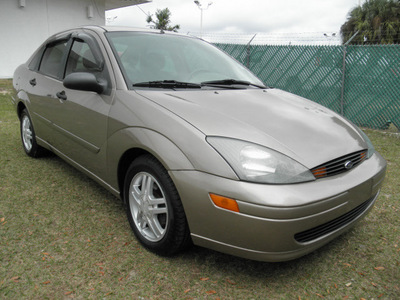 ford focus 2003 gold sedan se gasoline 4 cylinders front wheel drive automatic 34474