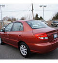 kia rio 2005 red sedan gasoline 4 cylinders front wheel drive 5 speed manual 99336