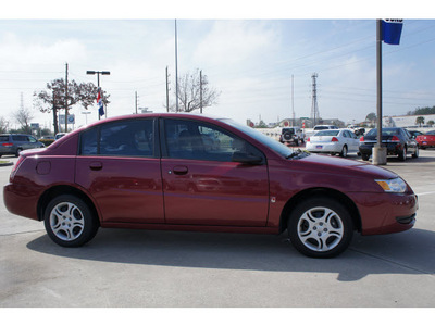 saturn ion 2005 red sedan 2 gasoline 4 cylinders front wheel drive 4 speed automatic 77090