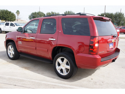 chevrolet tahoe 2012 red suv lt flex fuel 8 cylinders 2 wheel drive 6 spd auto,elec cntlled t 77090