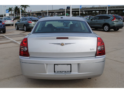 chrysler 300 2010 silver sedan touring gasoline 6 cylinders rear wheel drive automatic 77065