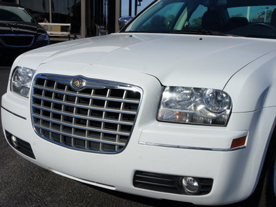 chrysler 300 2010 white sedan touring gasoline 6 cylinders rear wheel drive automatic 33021