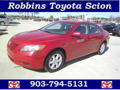 toyota camry 2009 red sedan le gasoline 4 cylinders front wheel drive automatic 75503