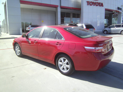 toyota camry 2009 red sedan le gasoline 4 cylinders front wheel drive automatic 75503